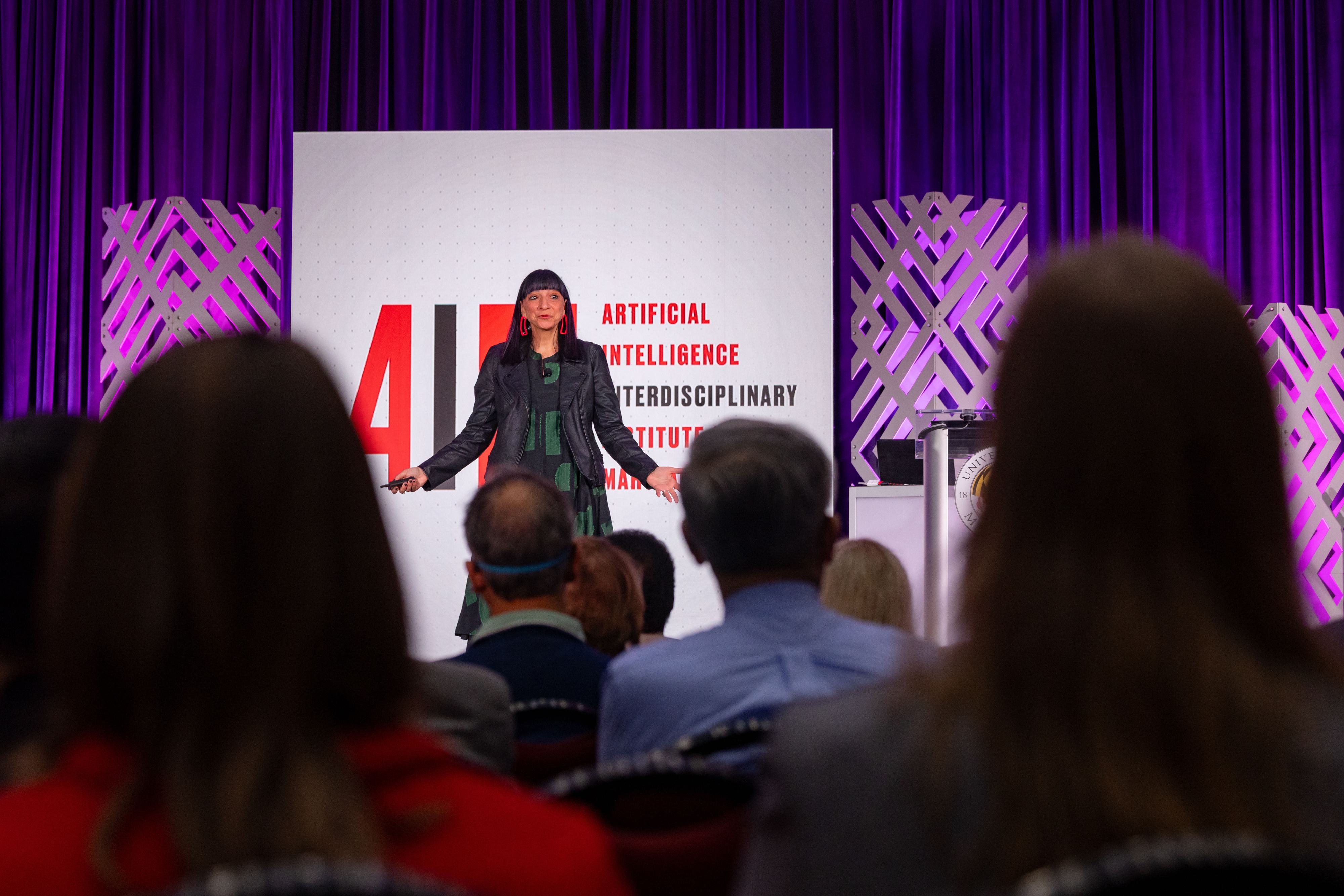Neda Atanasoski addresses crowd at AIM launch event