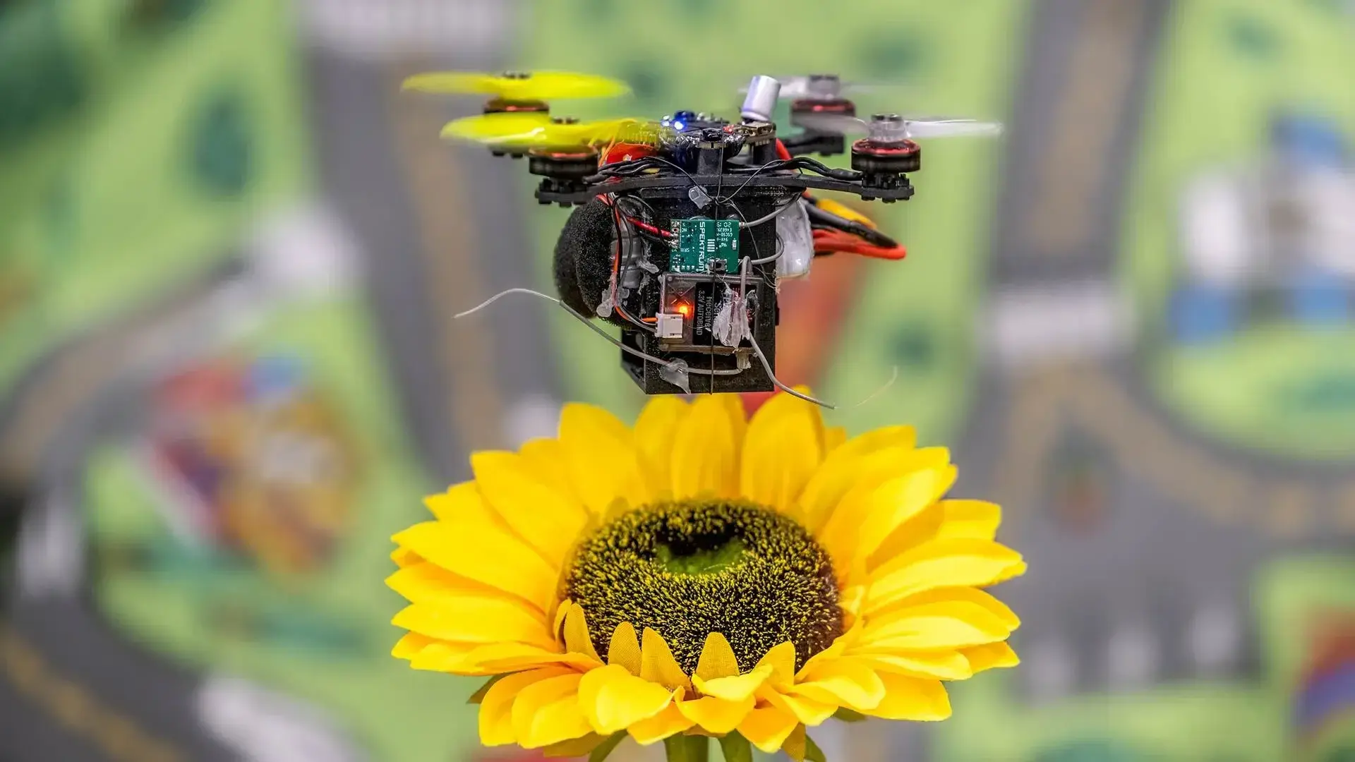 robotic bee over sunflower