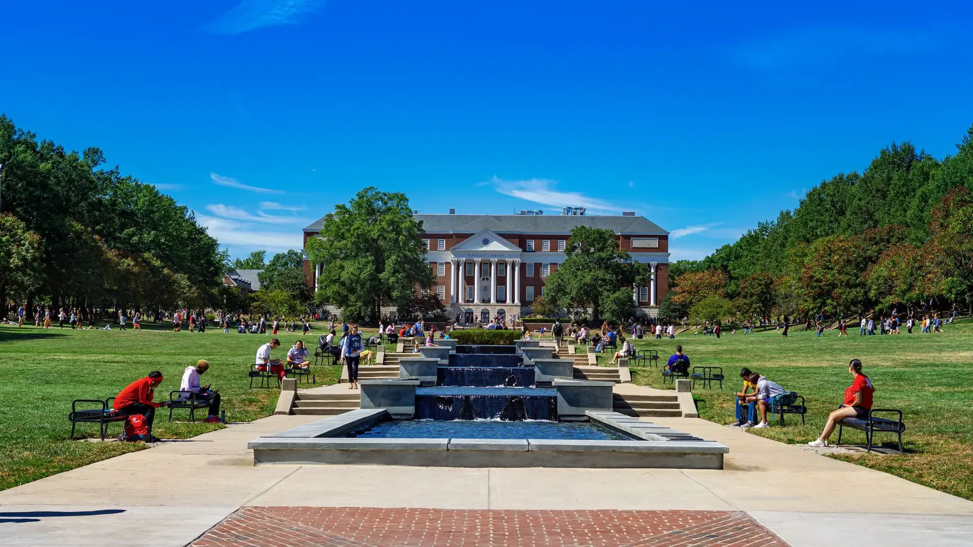 Mckeldin Mall on a bright sunny day, looking up to McKeldin Library from the base of the ODK fountain.