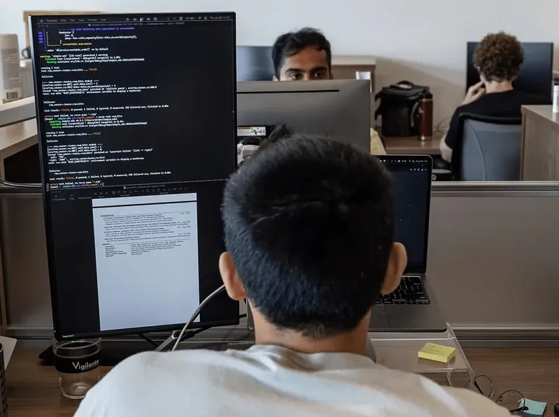 Students at computer screens