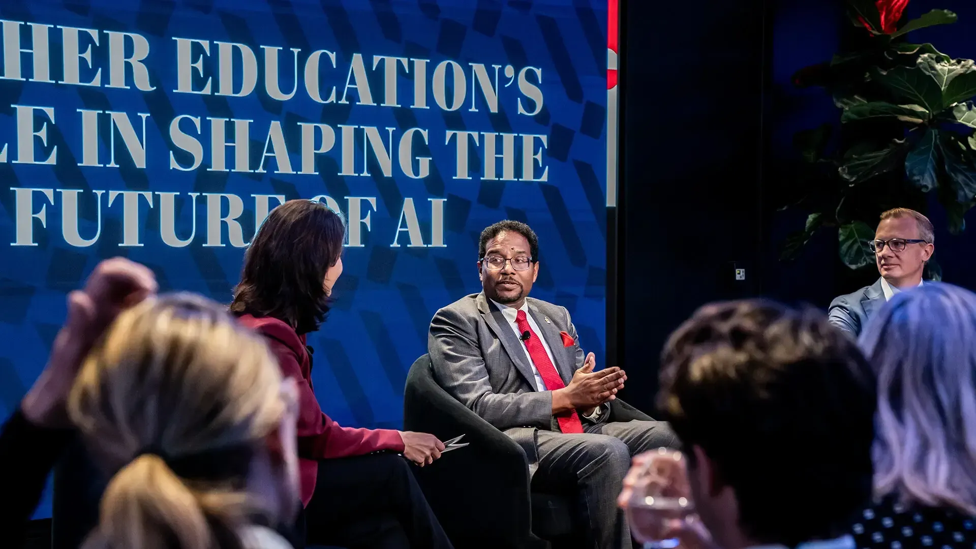 WP Intelligence Editorial Director Luiza Savage (left) talks with UMD President Darryll J. Pines and Professor Hal Daumé III, director of the Artificial Intelligence Interdisciplinary Institute at Maryland (AIM), at The Washington Post Global AI Summit in New York City on Tuesday.