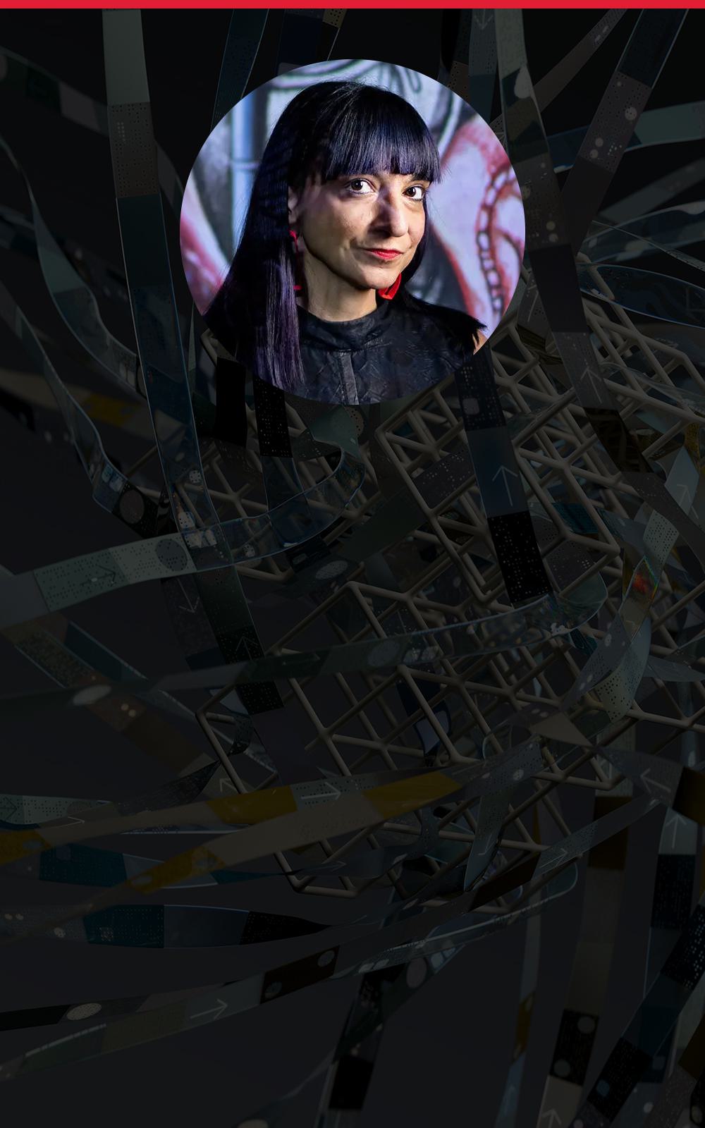 portrait of a woman in front of a light mural